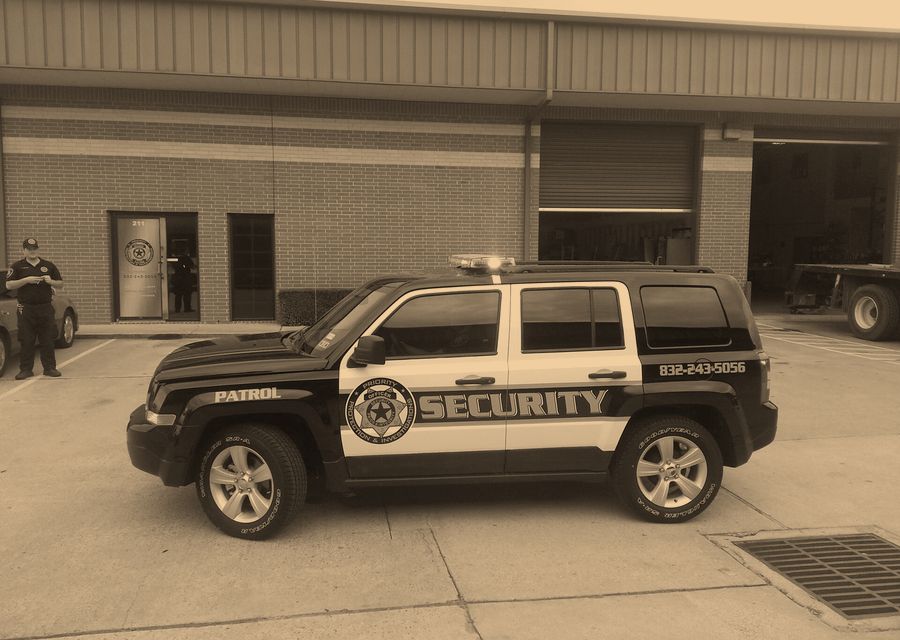 Marked security patrol vehicle responding on site