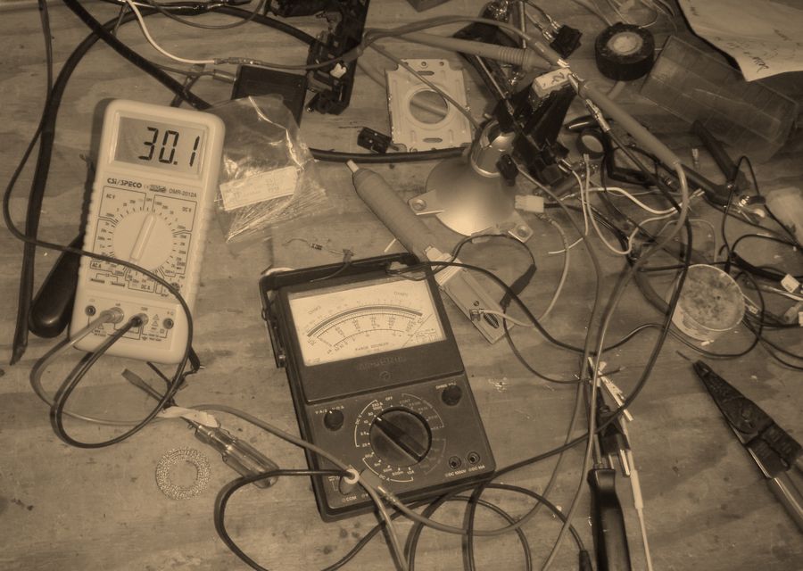 Technical counter-surveillance instruments on a workbench